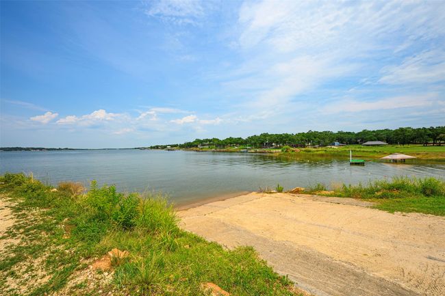 Water view with a boat ramp | Image 15