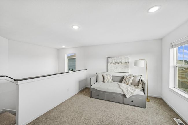 The spacious upstairs loft. | Image 17