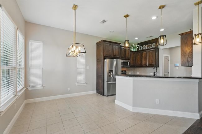 Dining area off kitchen and living room | Image 9