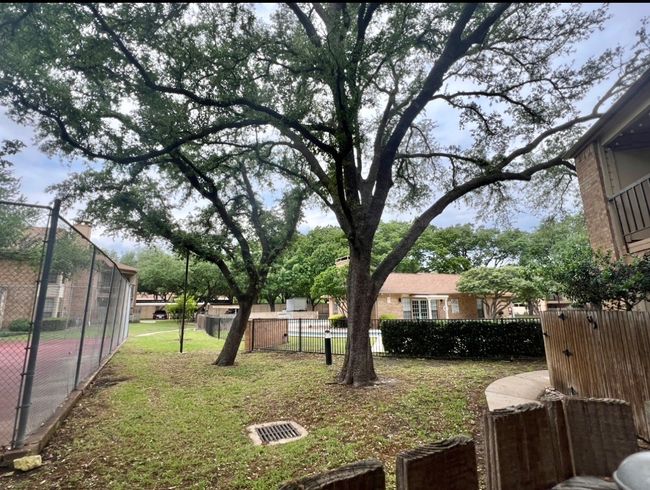 View of yard featuring fence | Image 26