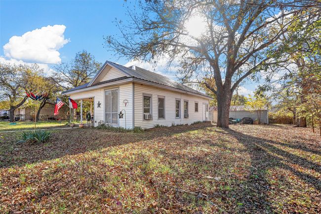View of side of home with cooling unit | Image 11