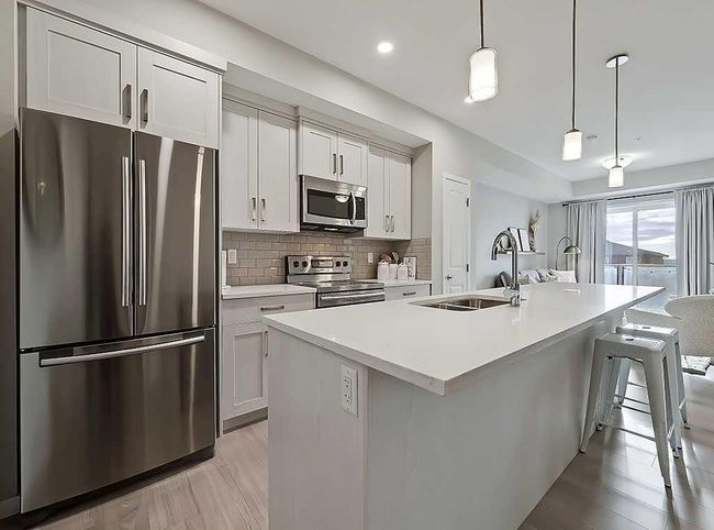 318 - 4350 Seton Dr Se, Condo with 1 bedrooms, 1 bathrooms and 1 parking in Calgary AB | Image 4