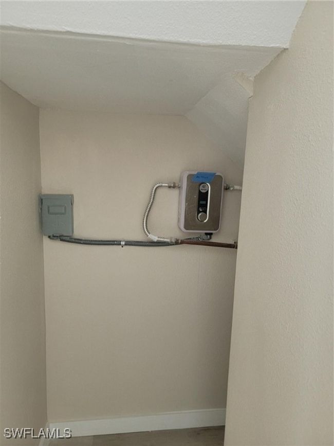 Laundry room featuring baseboards | Image 22