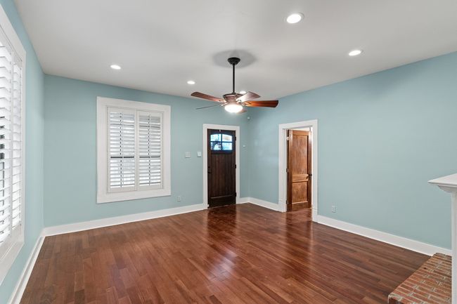 Entryway with ceiling fan, wood finished floors, recessed lighting, and baseboards | Image 9