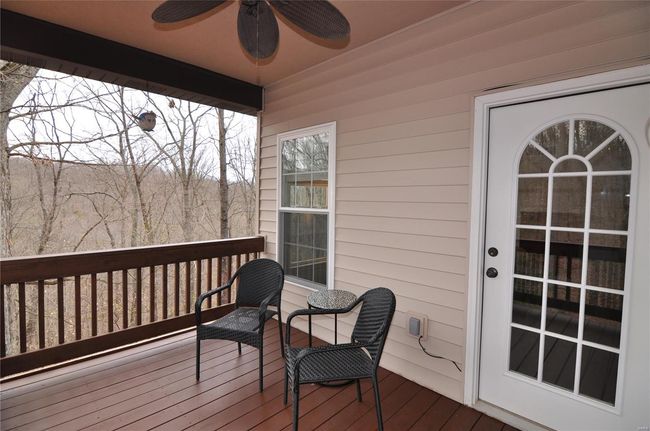 Private covered deck off of Primary Owner's Suite. | Image 21