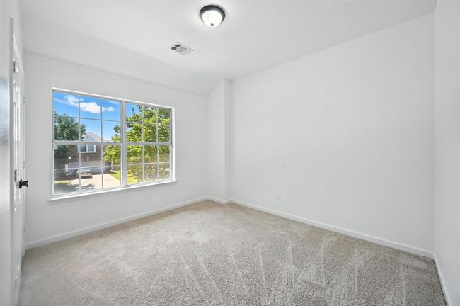 Carpeted empty room with baseboards | Image 20