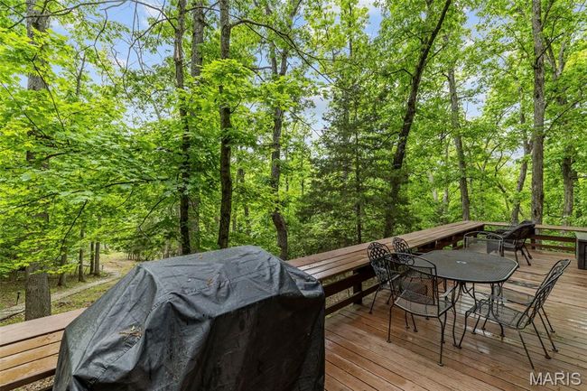 Wooden terrace with outdoor dining space | Image 60