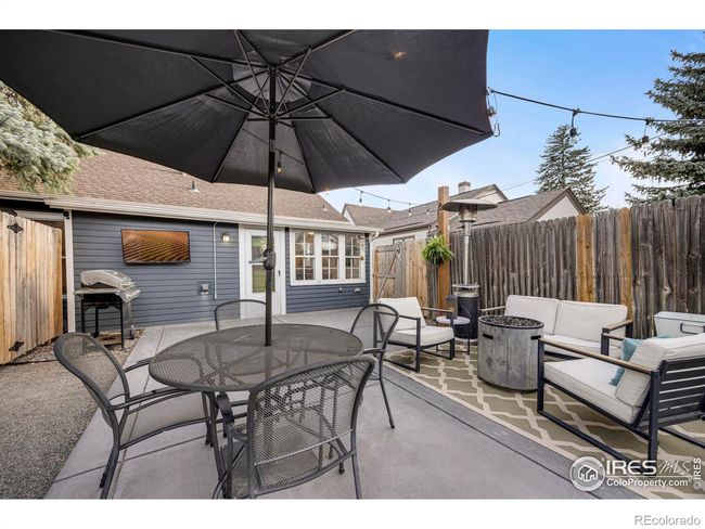 Private Backyard with newer concrete patio and privacy fencing. | Image 33