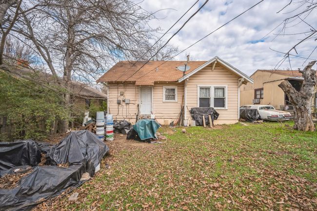 Rear view of house featuring a yard | Image 9