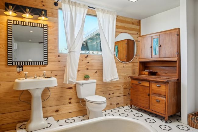 Studio-style living with bedroom and bathroom together in one big room. | Image 11