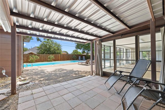Patio off of primary suite with hot tub | Image 31
