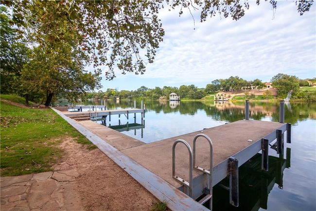Dock area featuring a water view | Image 29