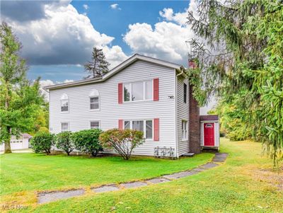 View of side of property with a yard | Image 1