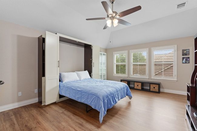Bedroom or Gameroom featuring a murphy bed that will convey | Image 19