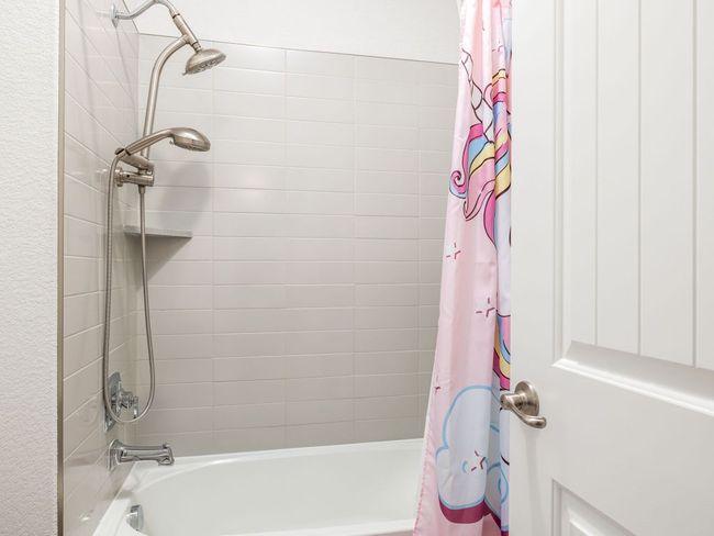 Bathroom with shower / bath combination with curtain | Image 24