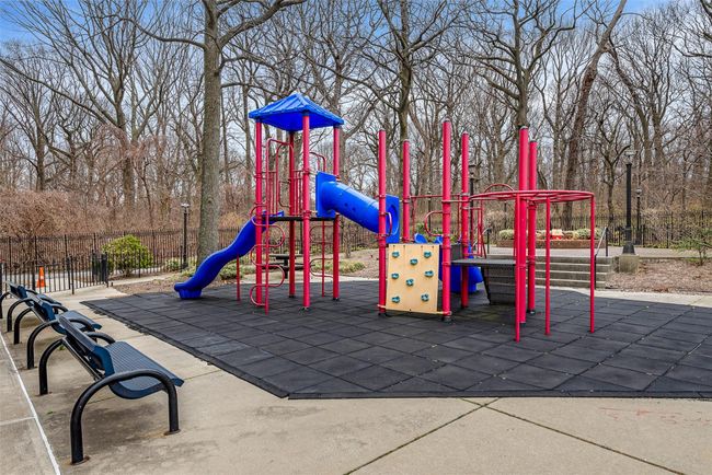 Community play area featuring fence | Image 23