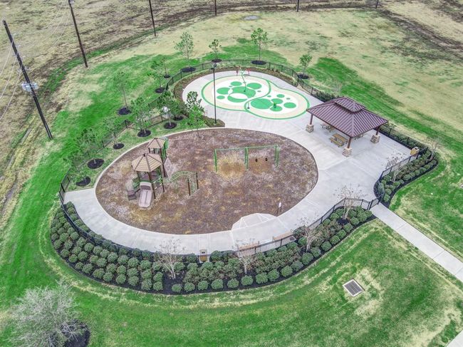 Family-friendly amenities include a five-acre park, recreation area with a splash pad, swimming pool, picnic area and green belts with walking paths. Plus, the subdivision is surrounded with restaurants, education opportunities, entertainment venues, shopping and more. | Image 16