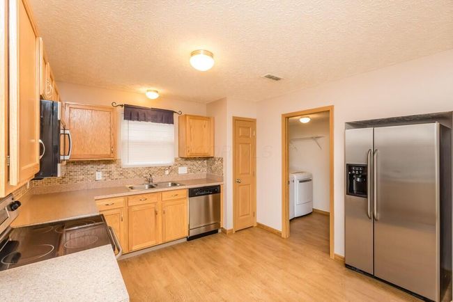 5975 Pennington Creek Dr, Condo with 3 bedrooms, 3 bathrooms and null parking in Dublin OH | Image 18