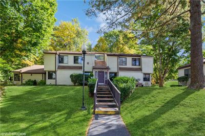 View of front of property featuring a front yard | Image 1