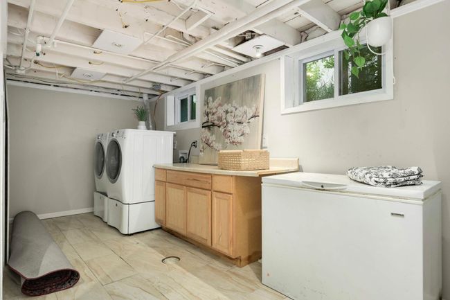 Lower level laundry room with extra storage | Image 19