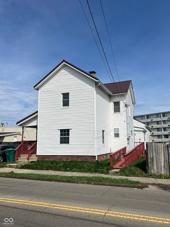view of side of property featuring fence | Image 4