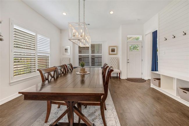 To the right of the dining area is the former second staircase that was removed and allowed for additional square footage and the large drop off area. | Image 15