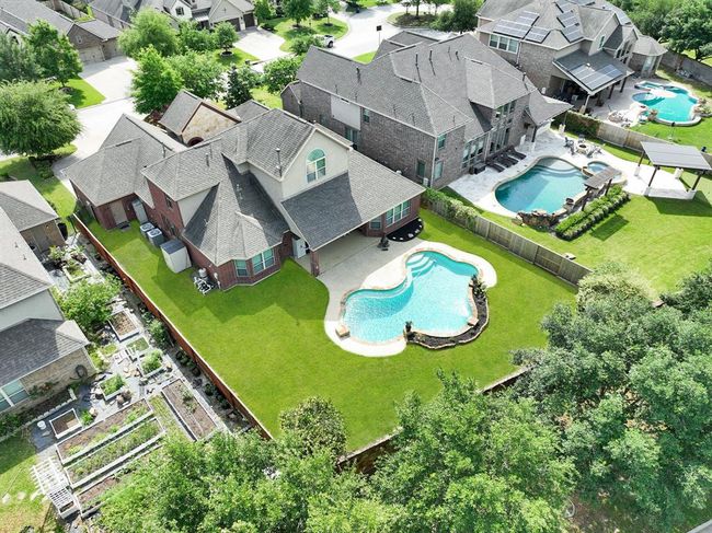 Aerial view gives a great shot demonstrating the spacious yard. | Image 46