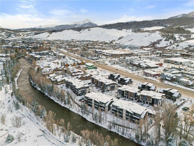 Snowy aerial view featuring a mountain view | Image 32