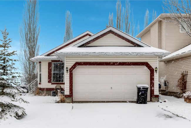 87 Tuscany Ridge View Nw, Home with 3 bedrooms, 2 bathrooms and 4 parking in Calgary AB | Image 1