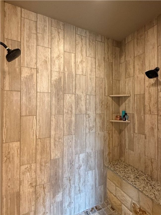 Full bathroom with a tile shower | Image 14