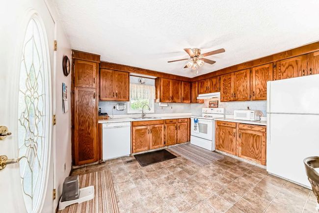 172 Big Hill Cir Se, House other with 3 bedrooms, 3 bathrooms and 2 parking in Airdrie AB | Image 10