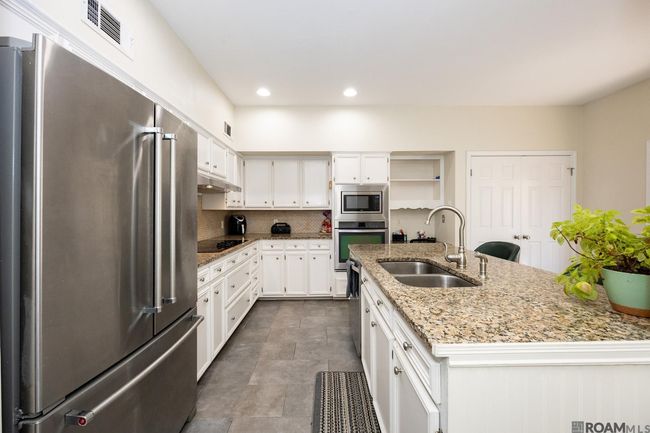 10218 N Magna Carta Pl, Townhouse with 4 bedrooms, 3 bathrooms and 2 parking in Baton Rouge LA | Image 8