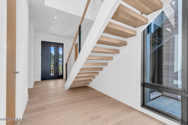 Open staircase with white oak treads and glass railings | Image 9