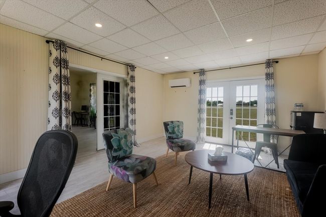 Manufactured Home - Beautiful updated kitchen with Quartz countertops and black stainless steel appliances. | Image 10