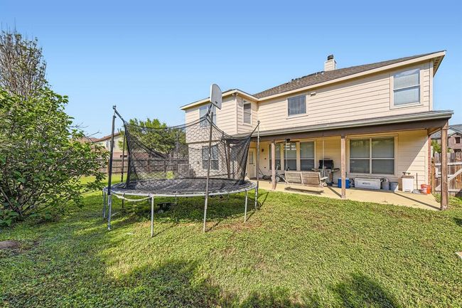 Covered Back Porch In The Large Fully Fenced Backyard | Image 27