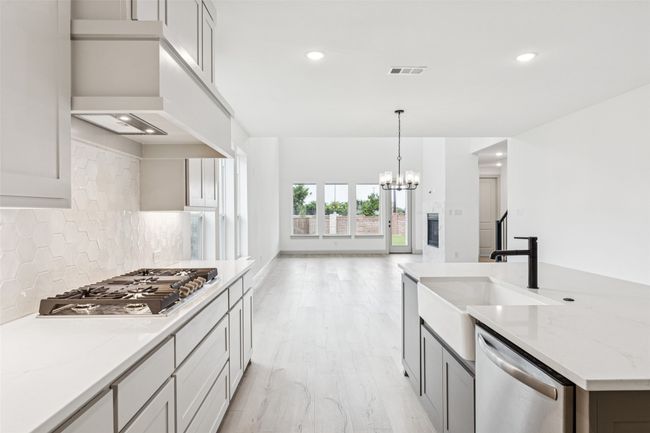 You'll love the stylish finishes, functional layout and wonderful space that this chef's kitchen offers! | Image 6