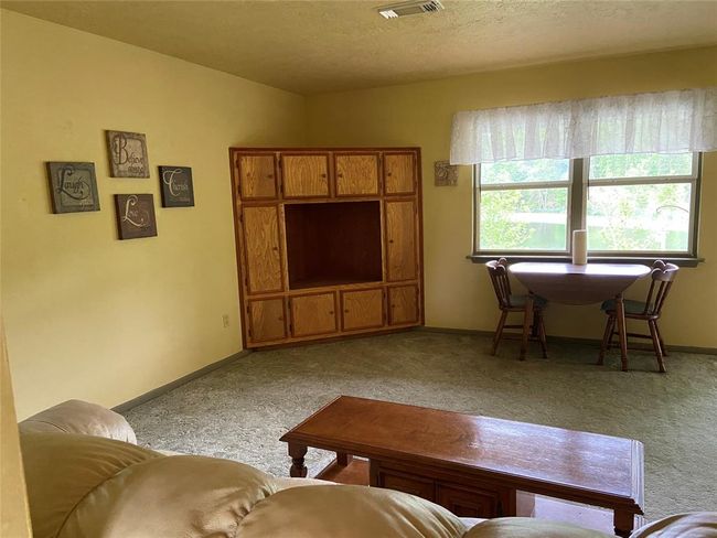 Built in storage in the living room | Image 14
