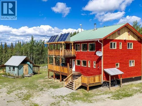 96750 Alaska Highway, House with 2 bedrooms, 2 bathrooms and null parking in Haines Junction YT | Card Image