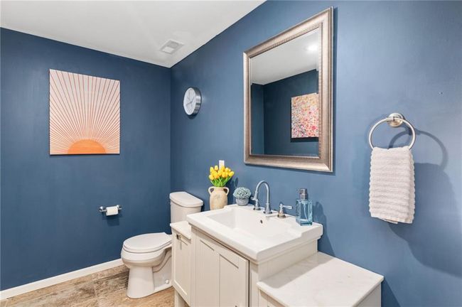 Bathroom featuring vanity and toilet | Image 42