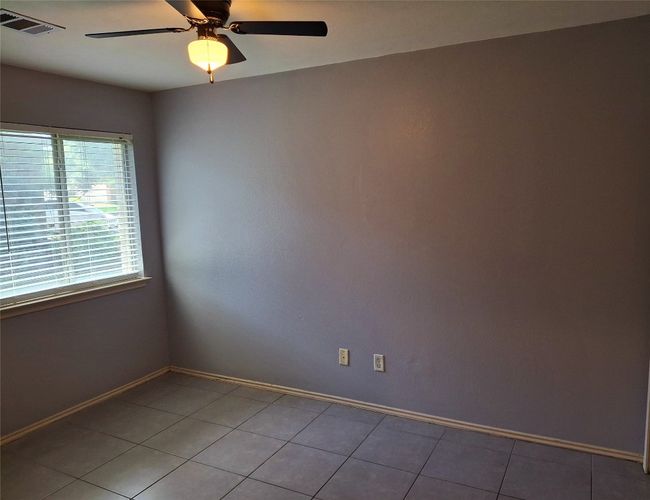 Ceiling fan, baseboards, and light tile patterned flooring | Image 9