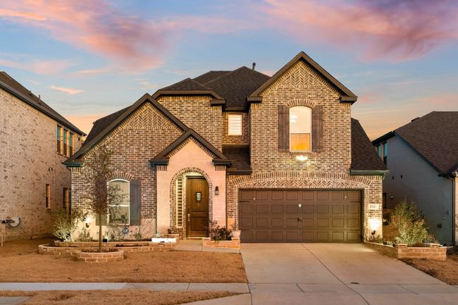 View of front of property with a garage | Image 30