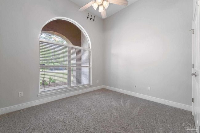 7008 Turnberry Cir, House other with 4 bedrooms, 2 bathrooms and 3 parking in Navarre FL | Image 11