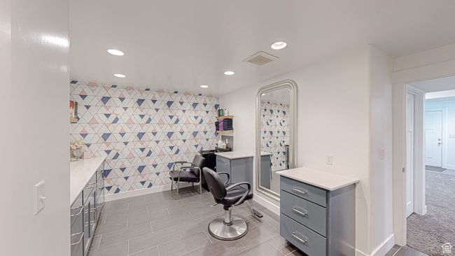 Home office featuring visible vents, an accent wall, and recessed lighting | Image 29