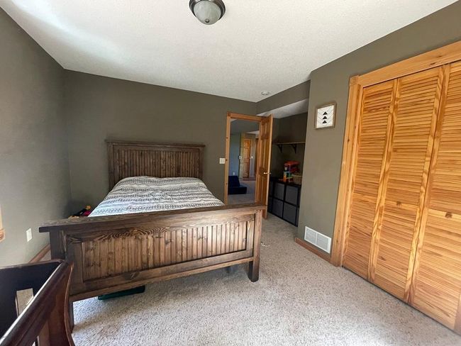 Second view of master bedroom. | Image 13