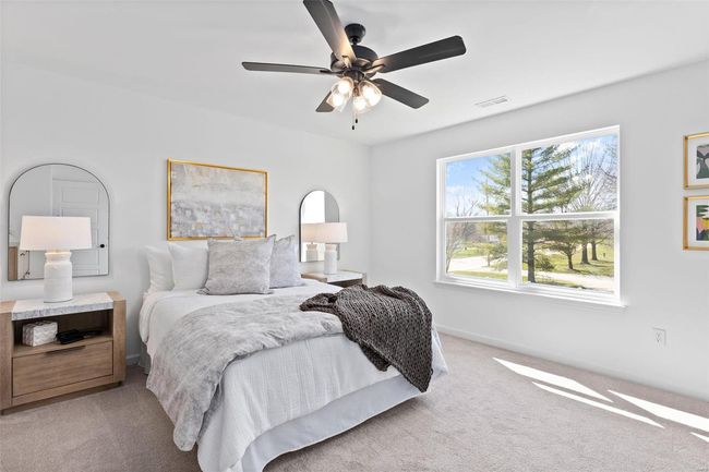 Carpeted bedroom with ceiling fan | Image 18