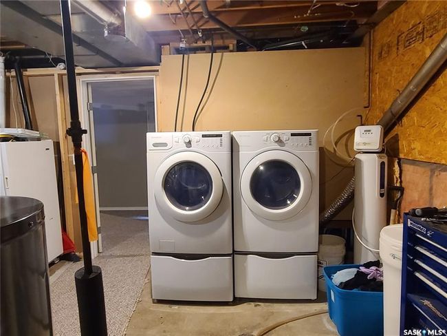Washroom featuring separate washer and dryer | Image 28