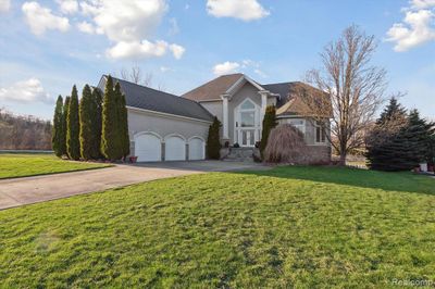 58736 Cory Lake Drive, Home with 4 bedrooms, 3 bathrooms and null parking in Washington Twp MI | Image 1