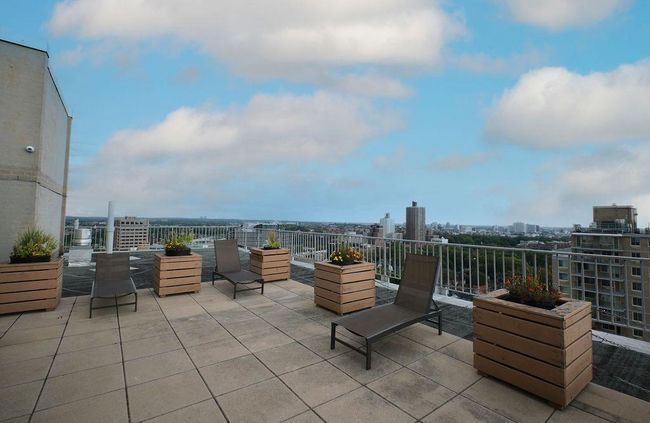 View of patio / terrace with a city view | Image 10