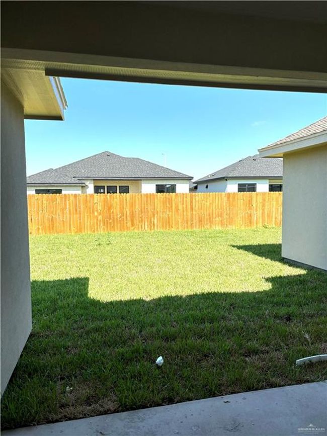 View of yard featuring fence | Image 13