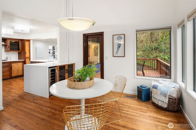 Breakfast table between livingroom and kitchen | Image 9